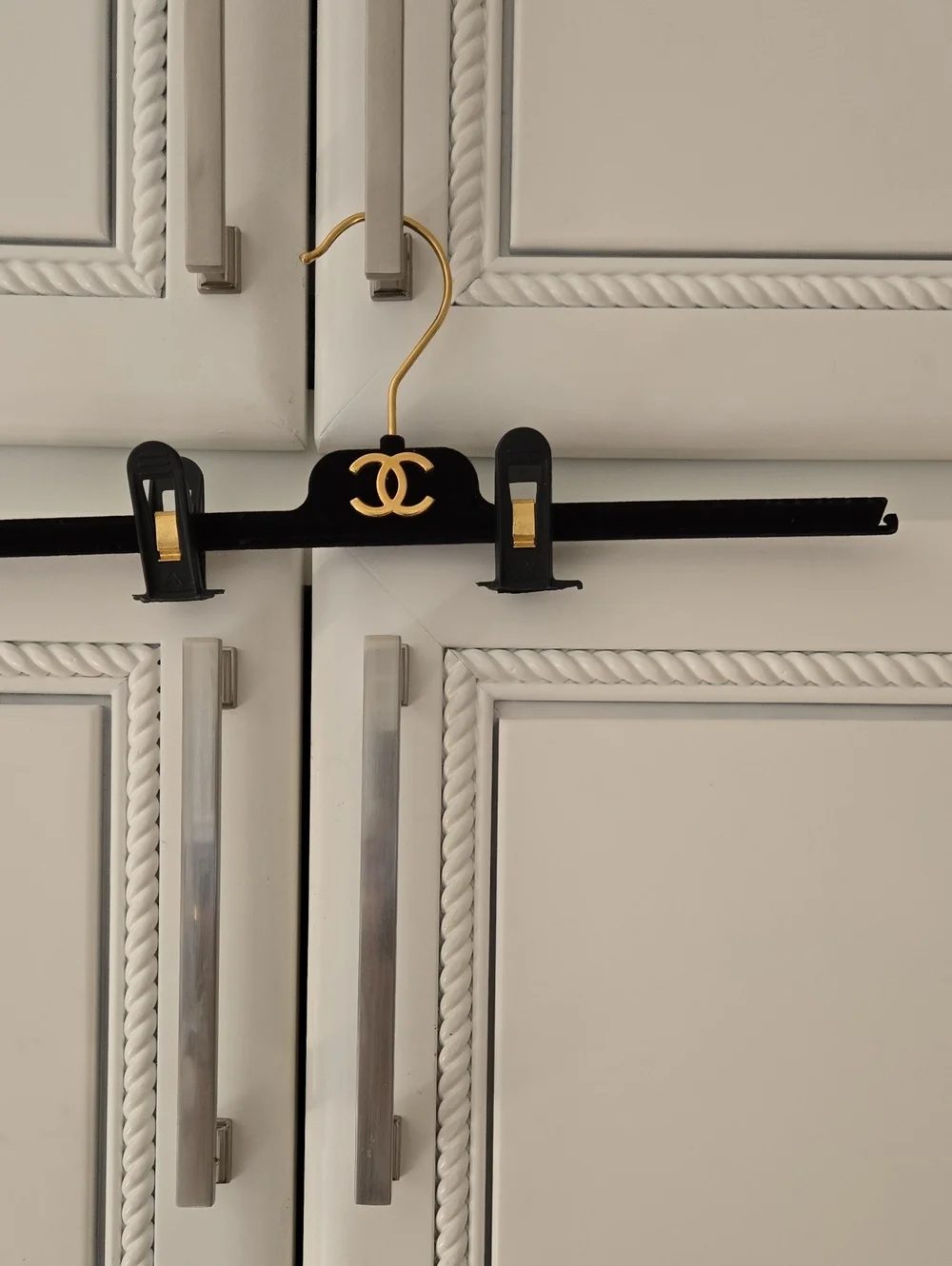 CHANEL Black and Gold Velvet Clip Hanger with CC Emblem